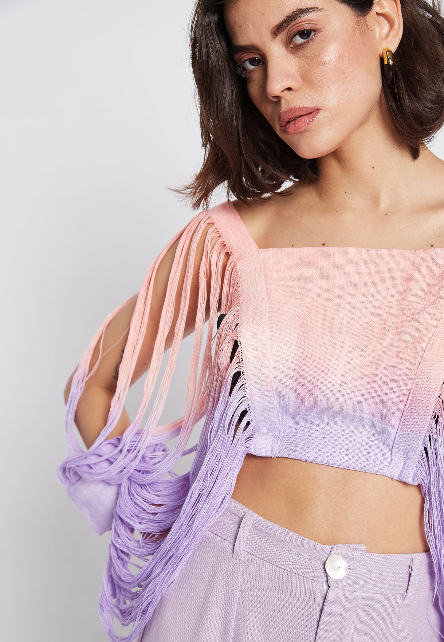 Top pesca illuminato dal sole