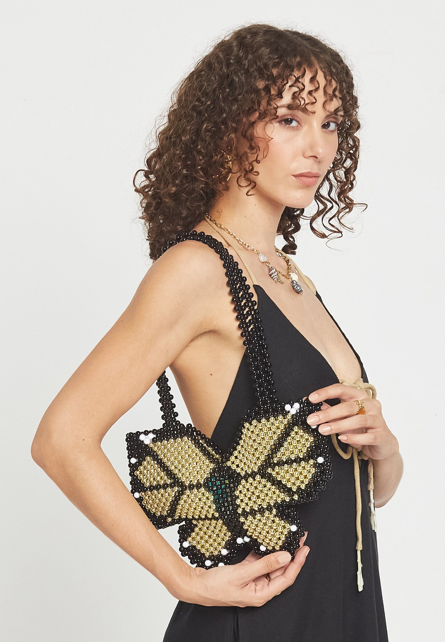 Borsa a mano nera a forma di farfalla