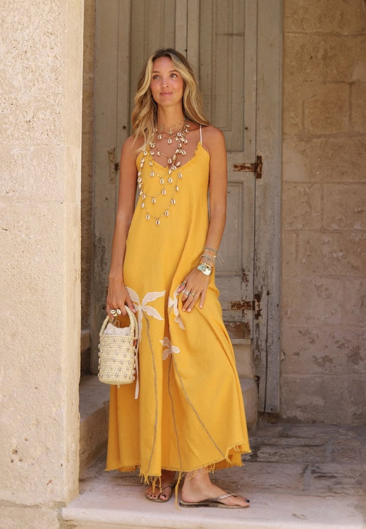 Abito lungo tropicale in mango