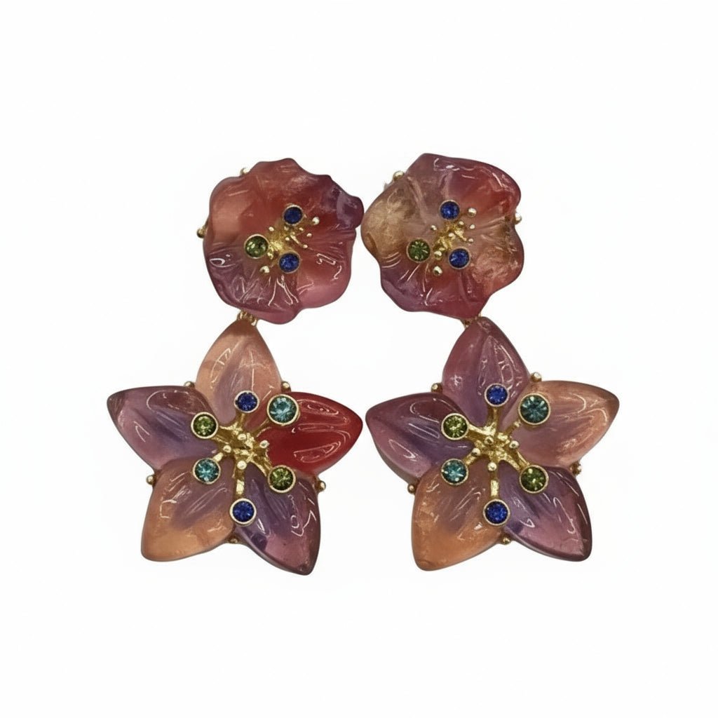 A pair of floral-style earrings with multicolored gemstones in gold-tone settings.